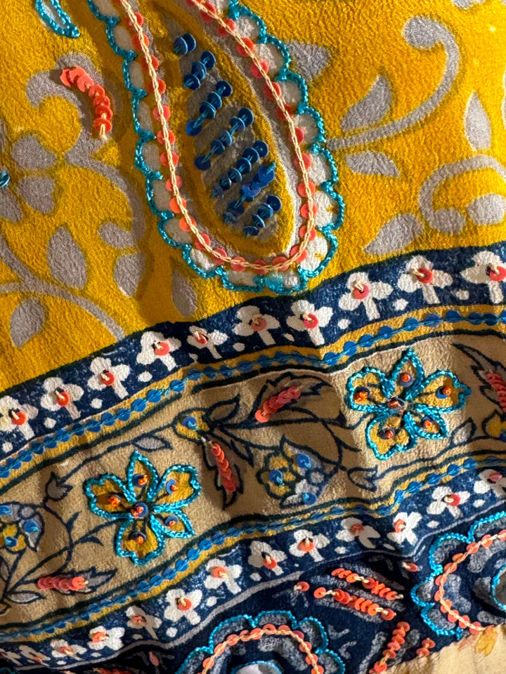Yellow vintage silk border with blue and orange embroidery