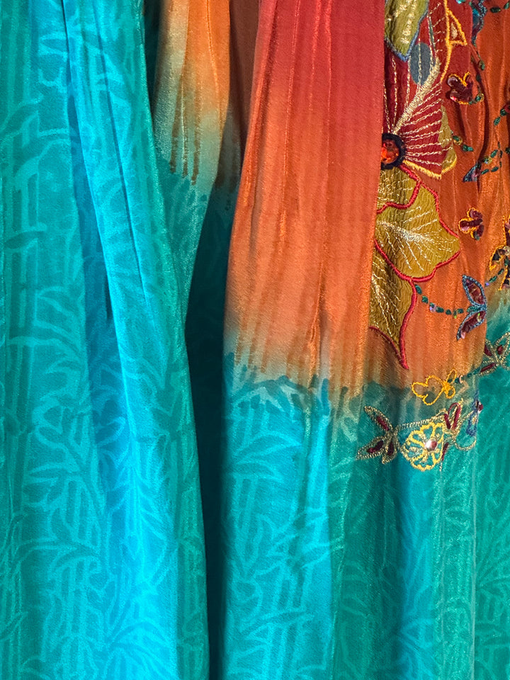 Blue green vintage silk with rust patterns and colorful embroidery