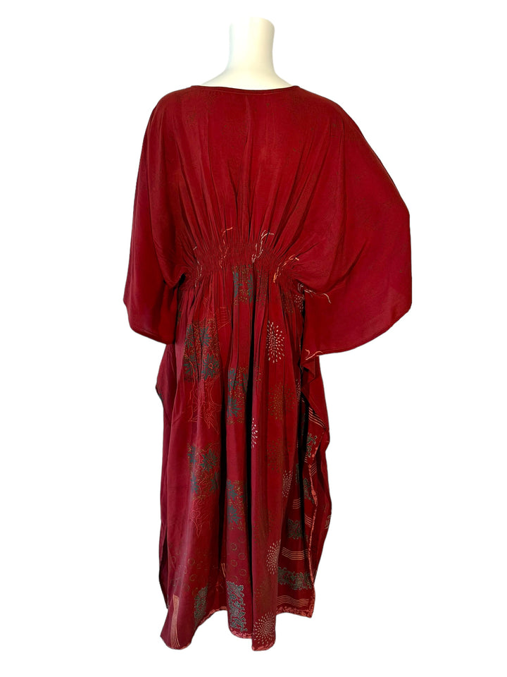 Back view of XXL vintage silk kaftan in deep red with floral embroidery