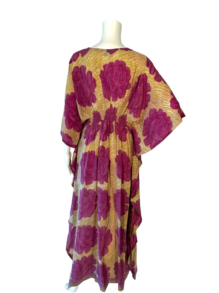Back view of ML vintage silk kaftan in tan with big fuchsia flowers