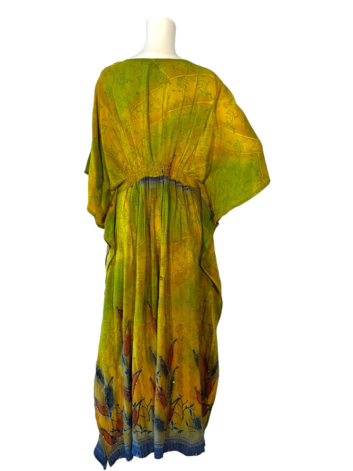 Back view of ML vintage silk kaftan in yellow and green with blue and red floral design