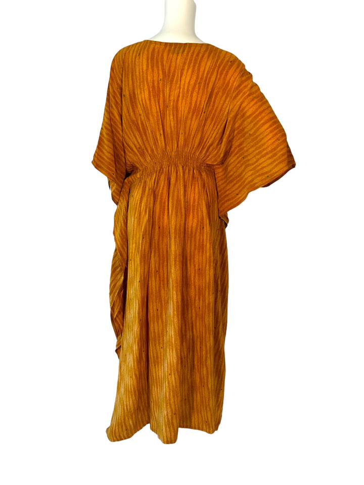 Back view of ML vintage silk kaftan in gold and orange stripe