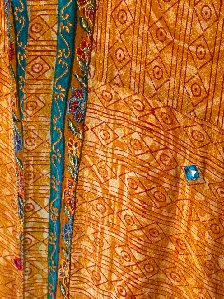 Orange with red vintage silk print and delicate colorful embroidery