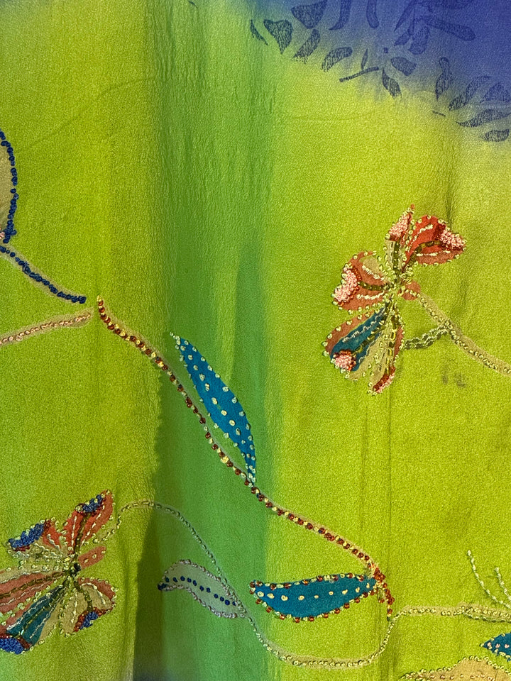 Bright green vintage silk with colorful embroidered flowers