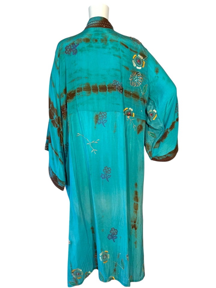 Back view of blue dip dyed vintage silk kimono with floral embroidery