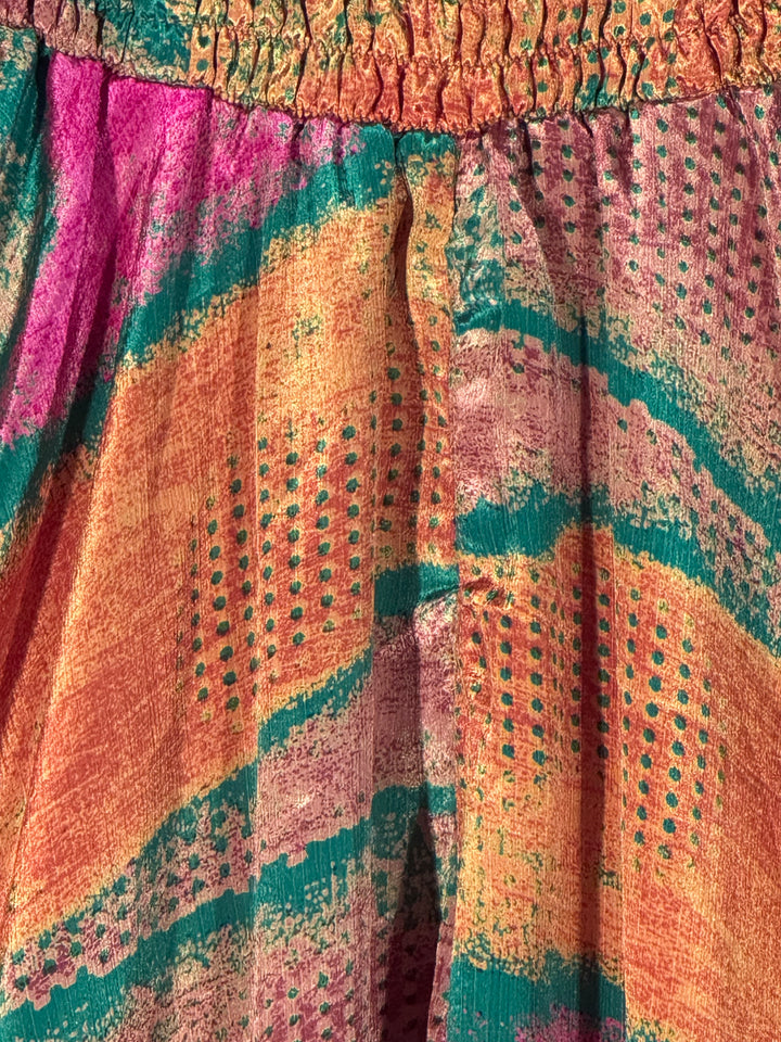 Pink, green, tan & orange swirl pring recycled silk blend print