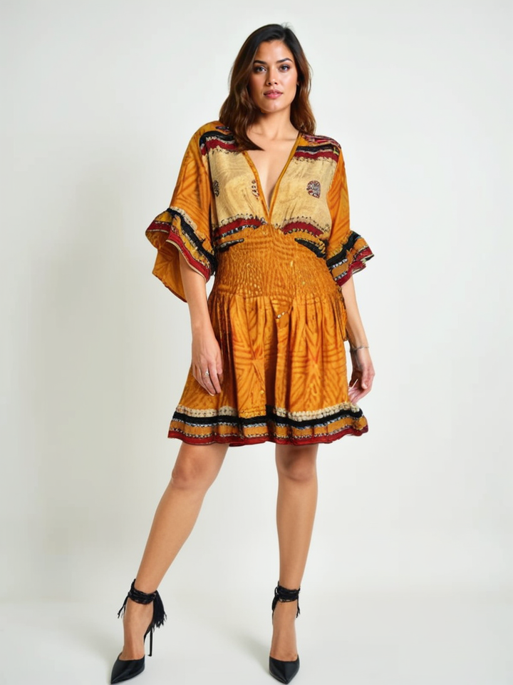 Model wearing Silk Ranch Sofia Dress #150 in gold vintage silk with print and embroidery