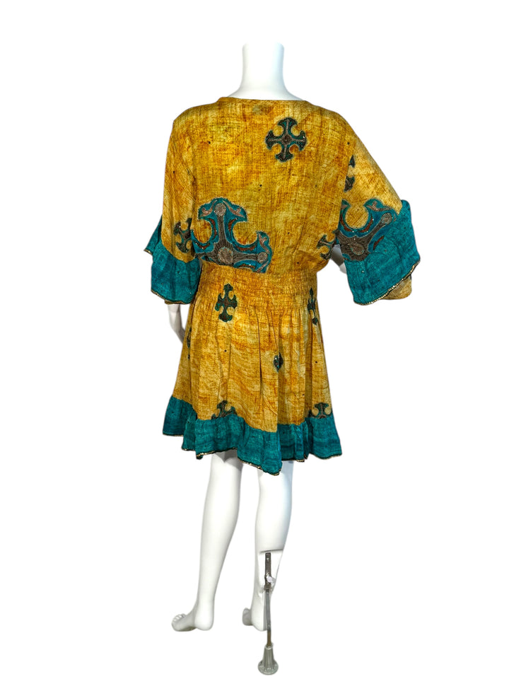 Sofia dress 156 back view on mannequin in yellow vintage silk