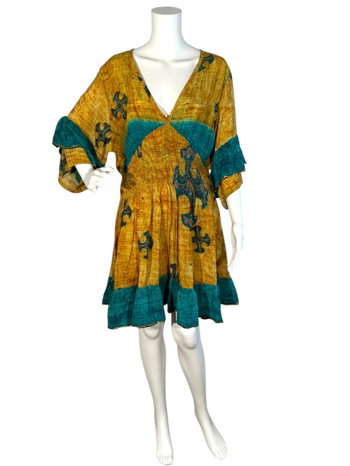 Sofia dress 156 front view on mannequin in yellow vintage silk