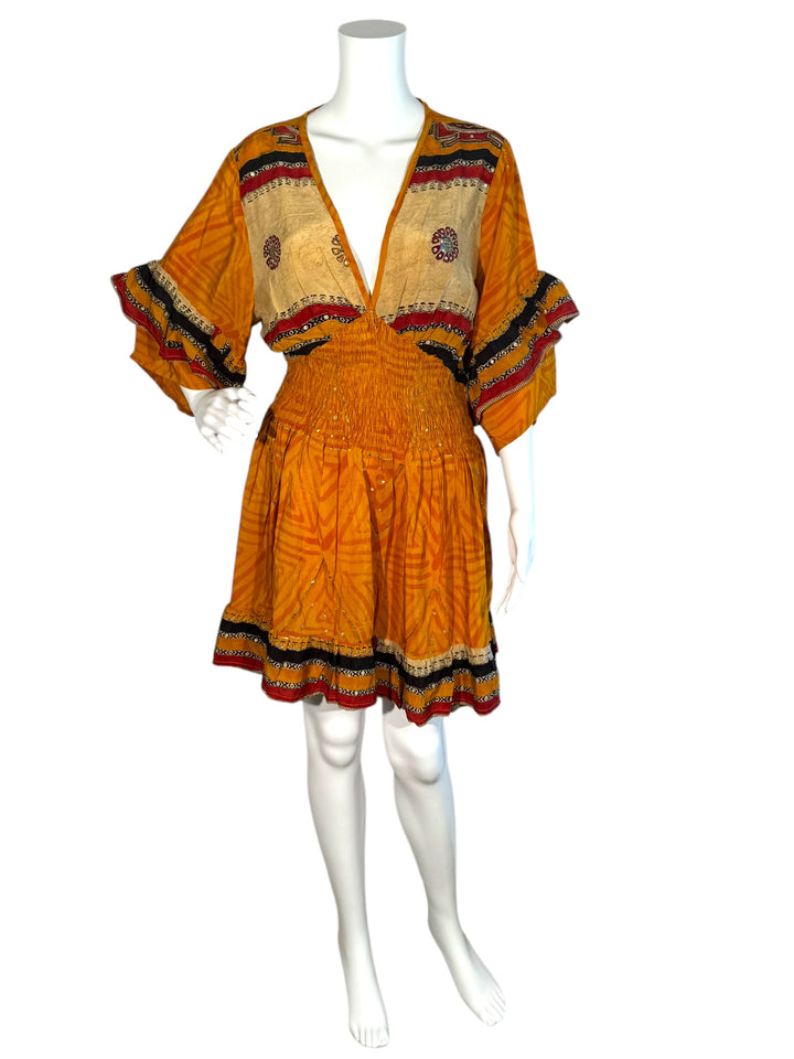 Sofia dress front view on mannequin in orange vintage silk