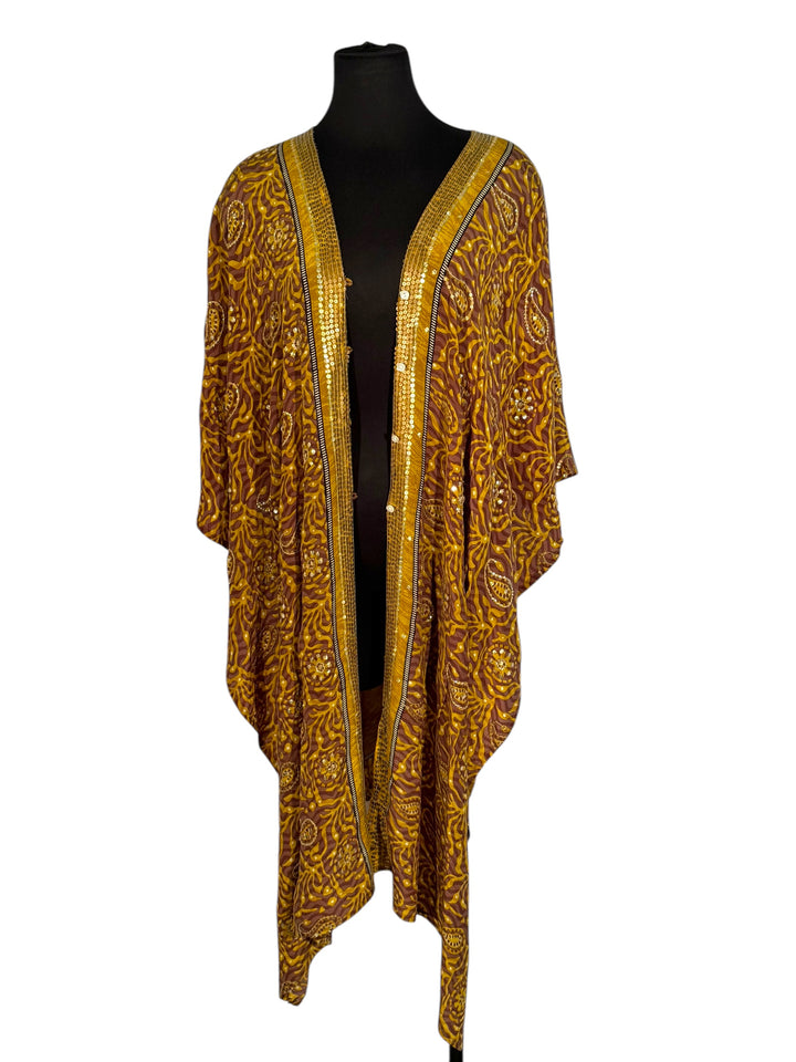 Front view of vintage silk Willow Wrap in gold vine and paisley print with emboidery and sequins