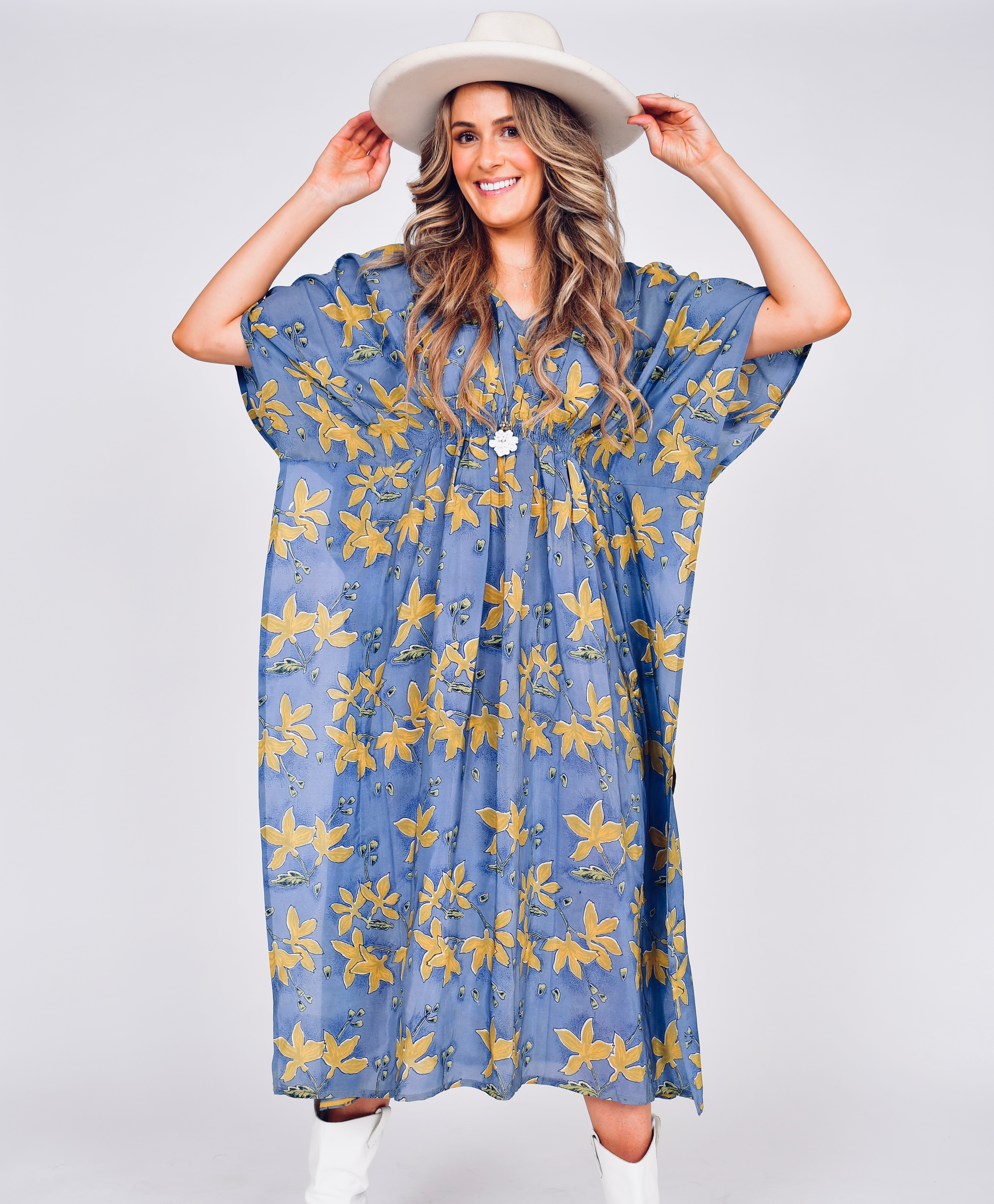 Vintage 100% silk kaftan style dress.  Each one is one-of-a-kind.