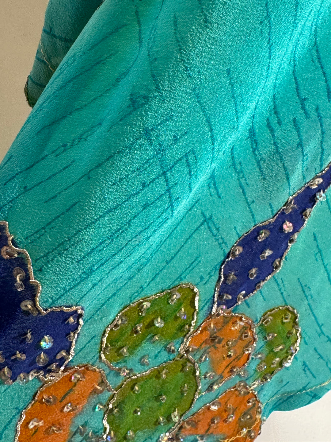 Blue vintage silk with silver embroidery on green and orange