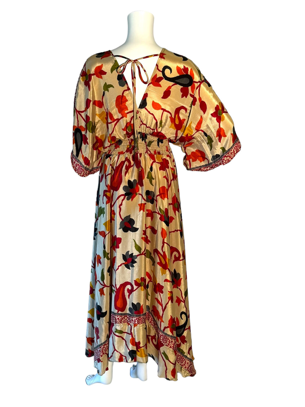 Reverse view of cream and red Boho dress in sustainable silk blend.