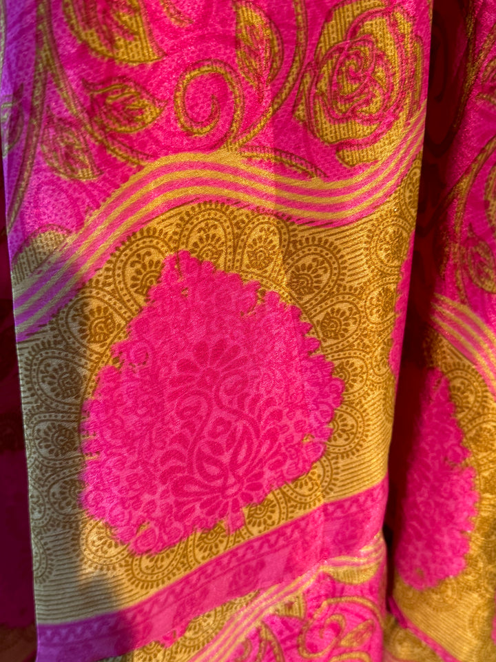 Bright pink and rose print on sustainable silk blend dress.