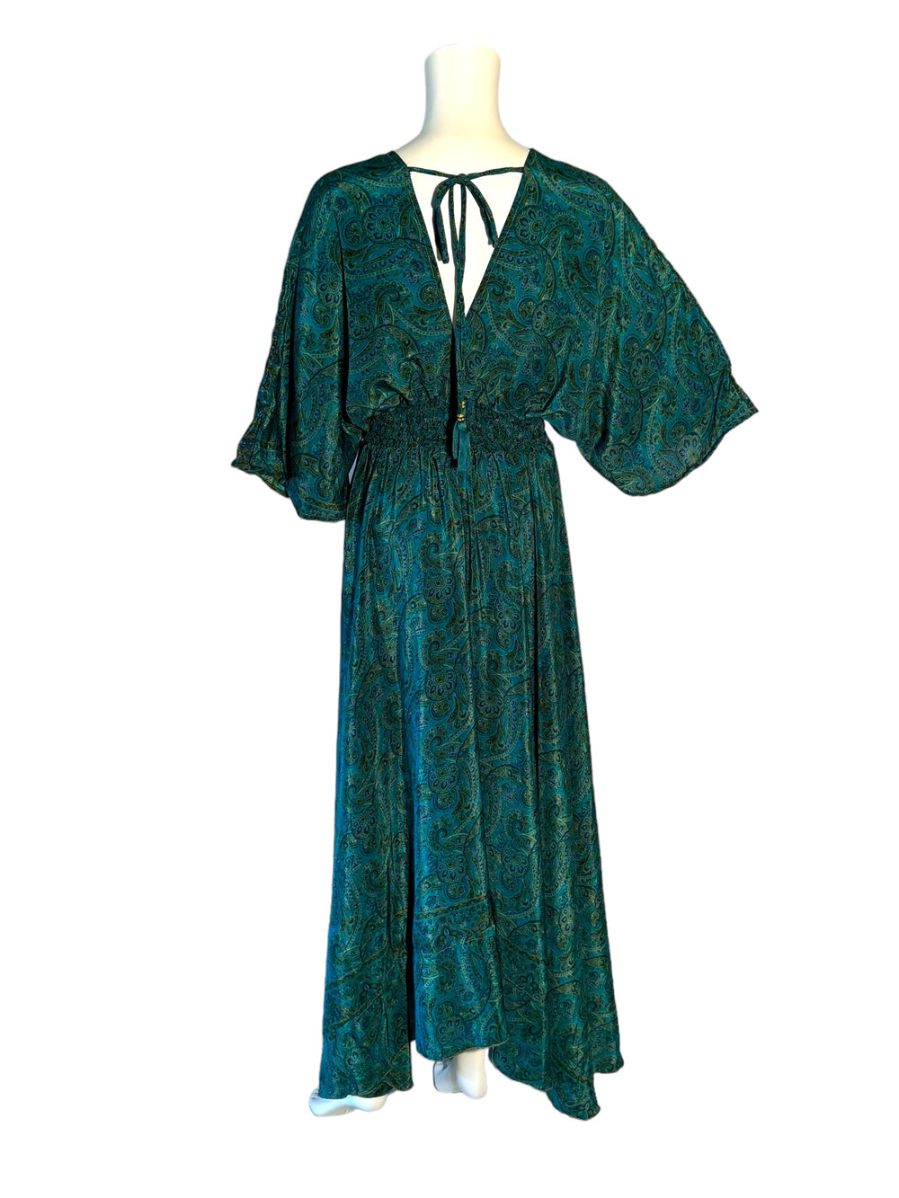 Reverse view of blue and green paisley boho sustainable silk blend dress.