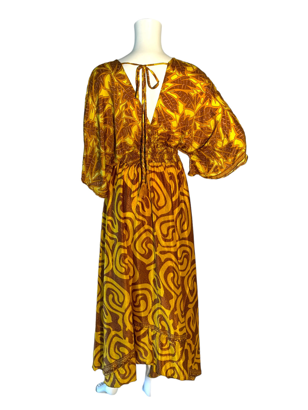 Reverse view of yellow and tan print Boho dress in sustainable silk blend.