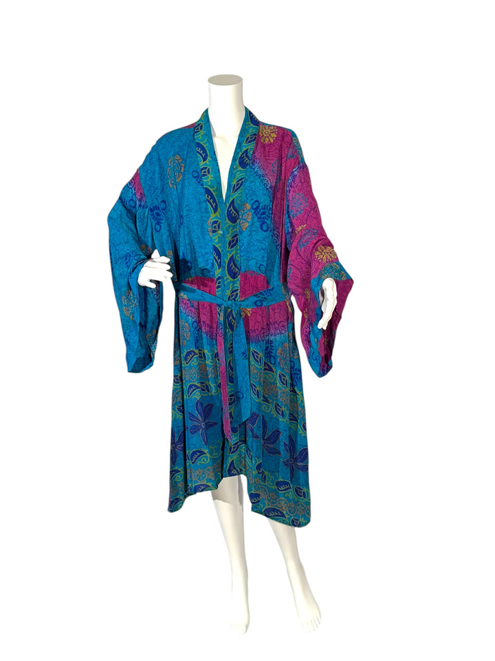 Front view of blue and fuchsia unisex kimono with large flowers