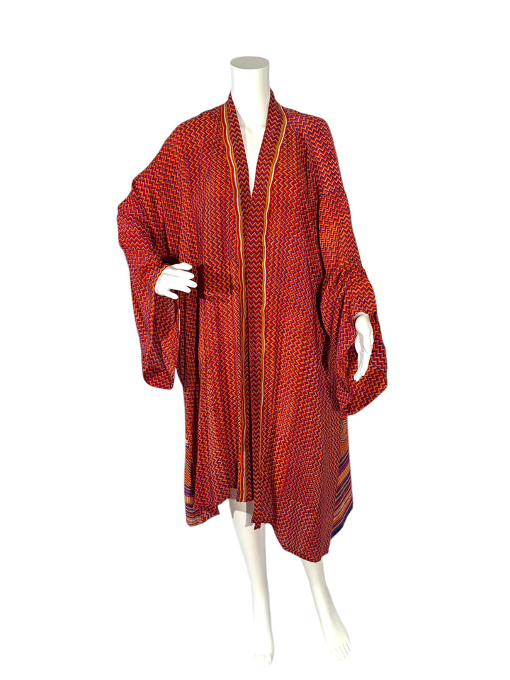 Front view of red zig zag print vintage silk unisex kimono without tie belt