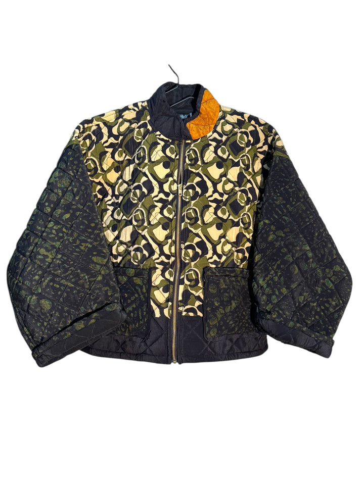 Two-tone quilted silk jacket with camouflage pattern on a white background