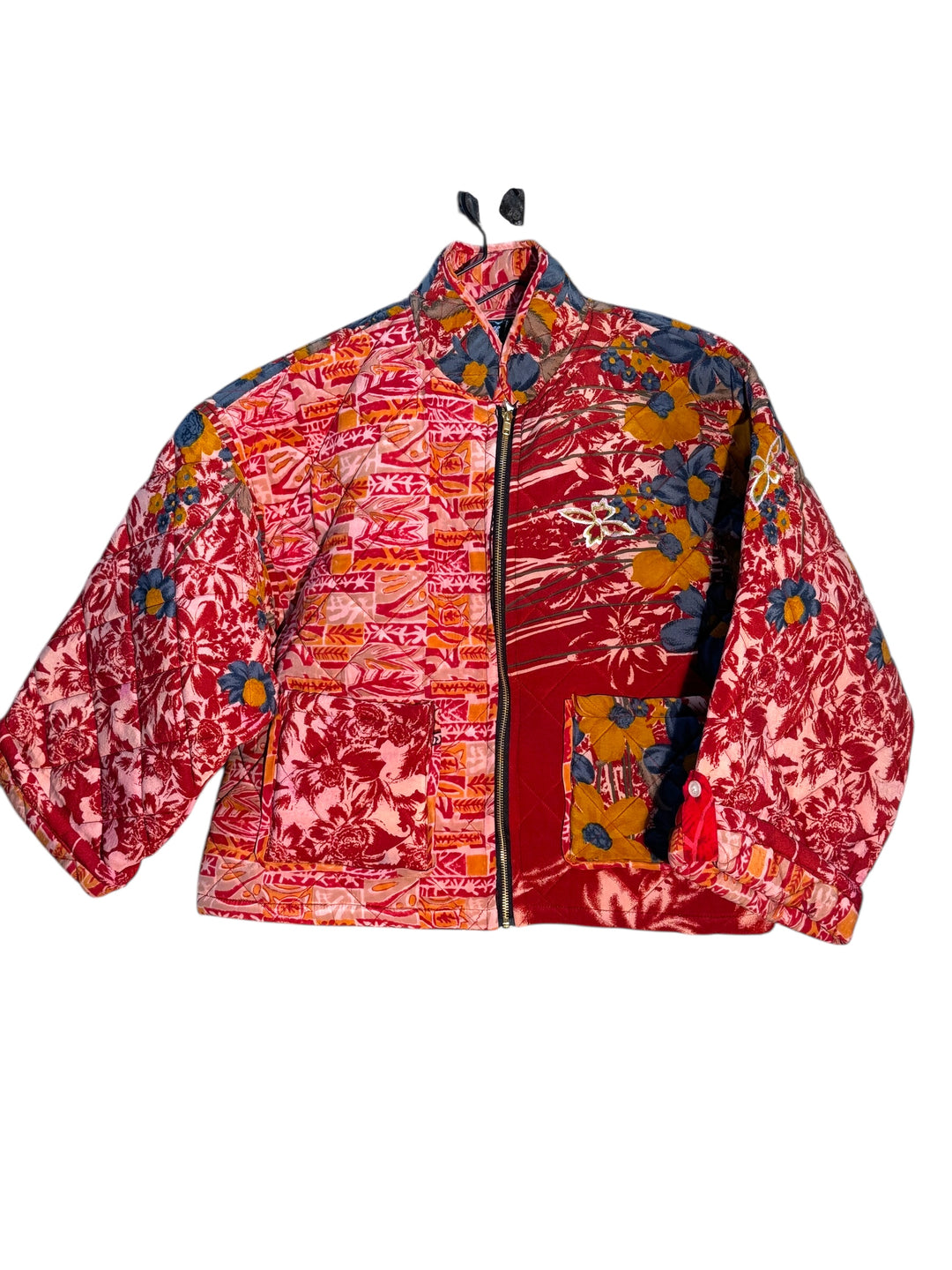 Colorful vintage quilted silk jacket with floral patterns in red and gold
