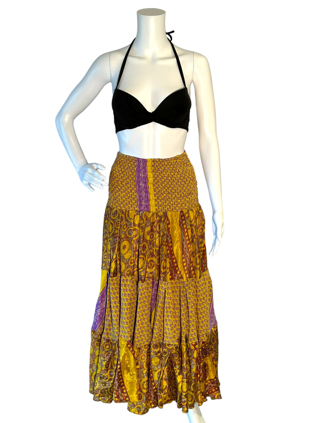 Yellow multi print maxi skirt in gathered tiers.  Wide elastic top can become a strapless dress.  Recycled Indian silks.