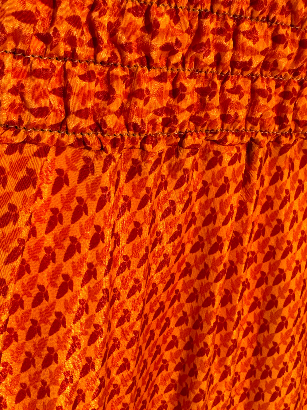 Orange print on vintage silk skirt