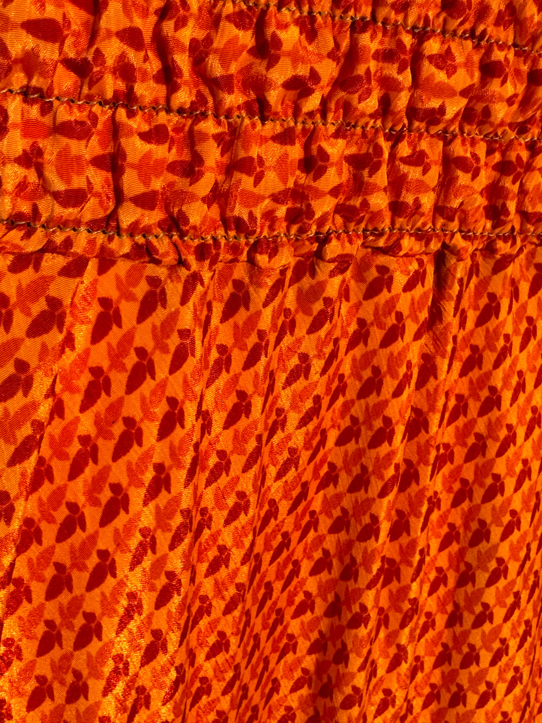 Orange print on vintage silk skirt