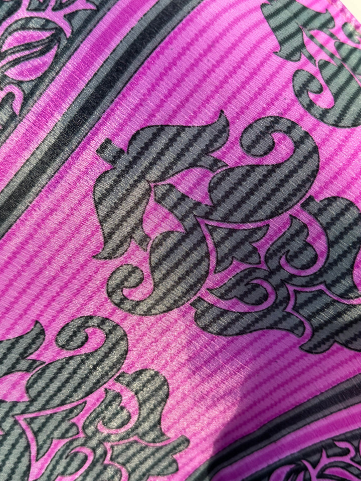 Pink and green print on sustainable silk blend dress.