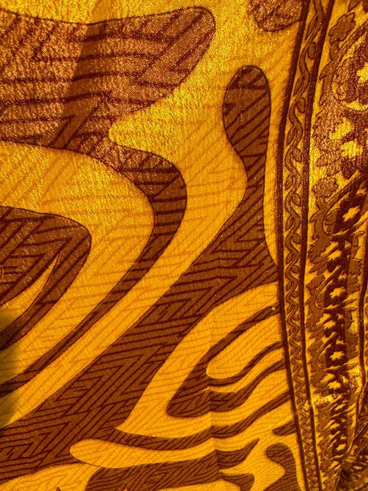 Yellow and tan print on sustainable silk blend dress.