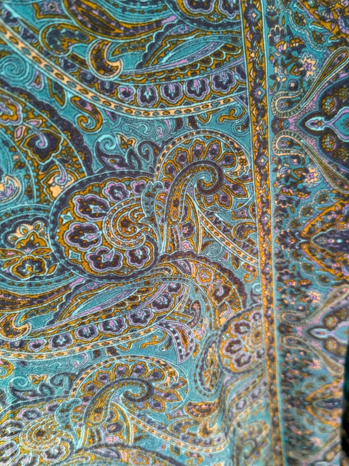 Blue and green paisley print on sustainable silk blend dress.