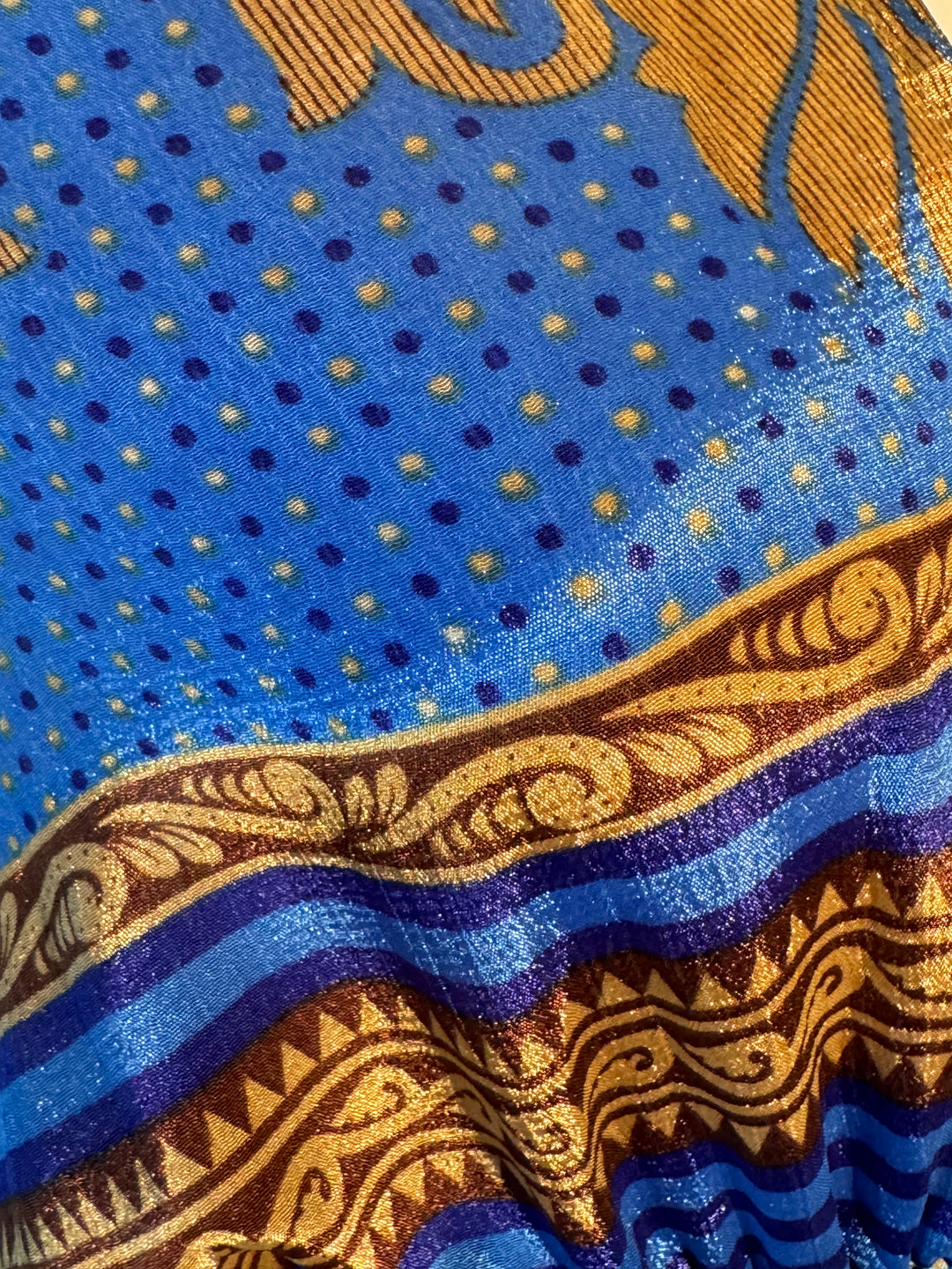 Blue and gold print on sustainable silk blend dress.