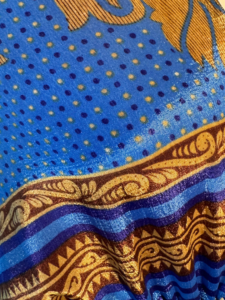 Blue and gold print on sustainable silk blend dress.