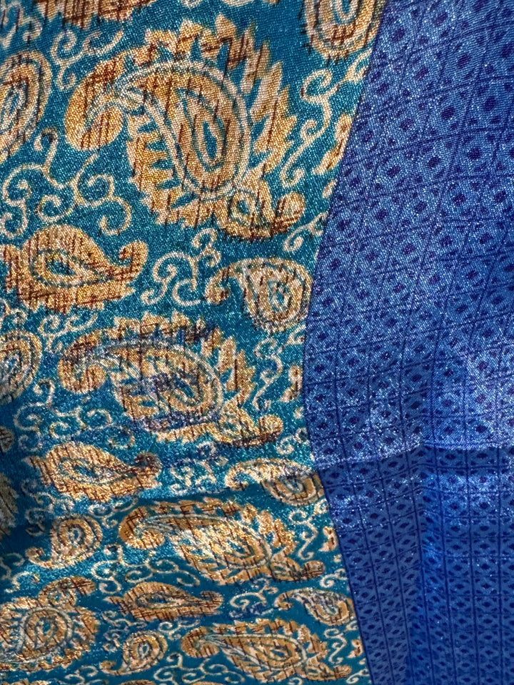 Blue and gold print on sustainable silk blend dress.