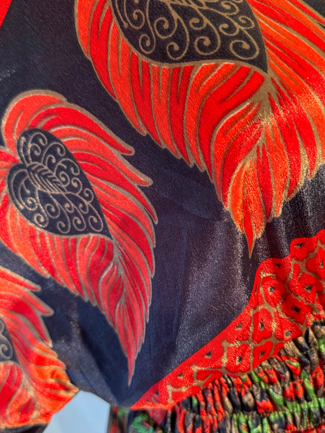 Red and navy print on sustainable silk blend dress.