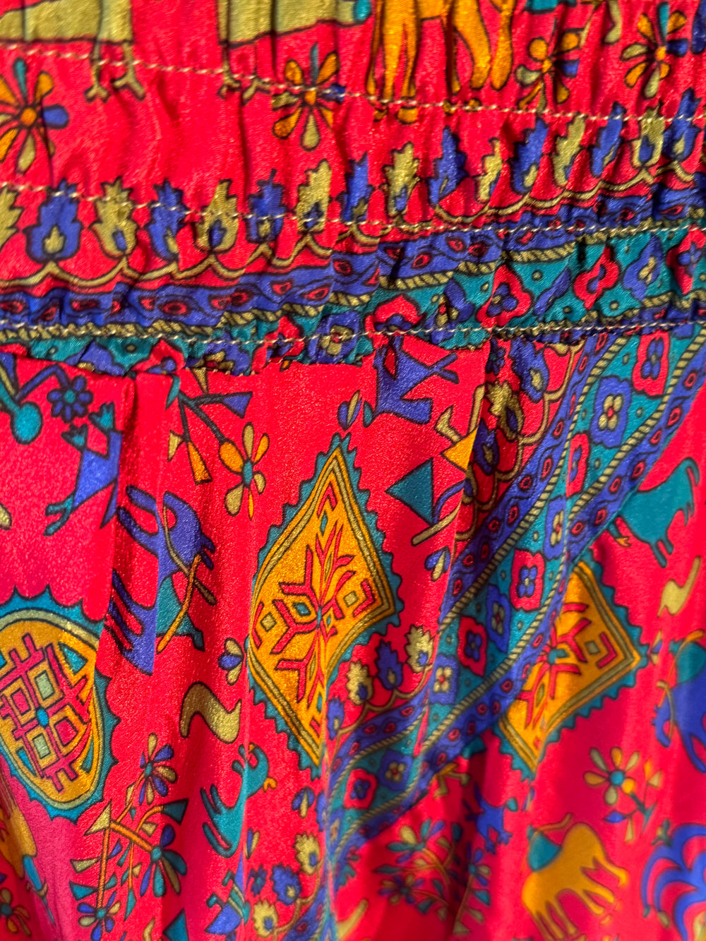 Red print on vintage silk skirt