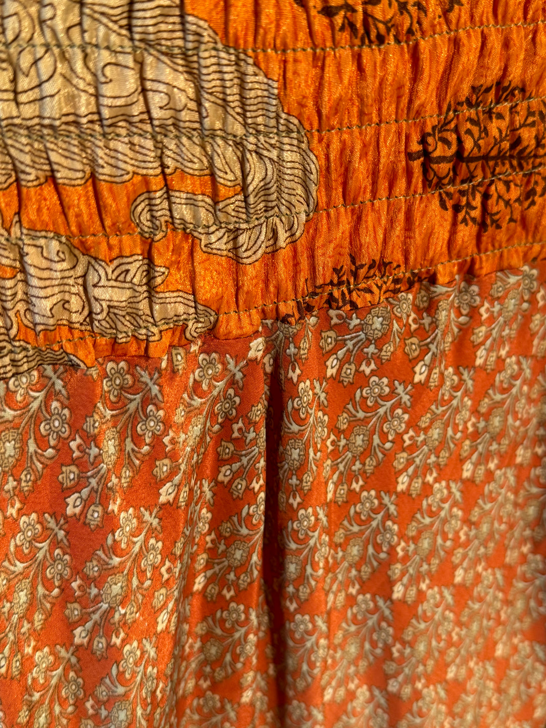 Orange print on vintage silk skirt