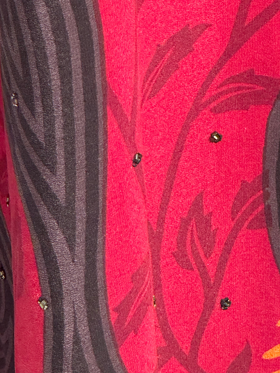 Ivy Kaftan by Silk Ranch in red vintage silk with black swirls, embroidery and golden sequins , fabric detail 1