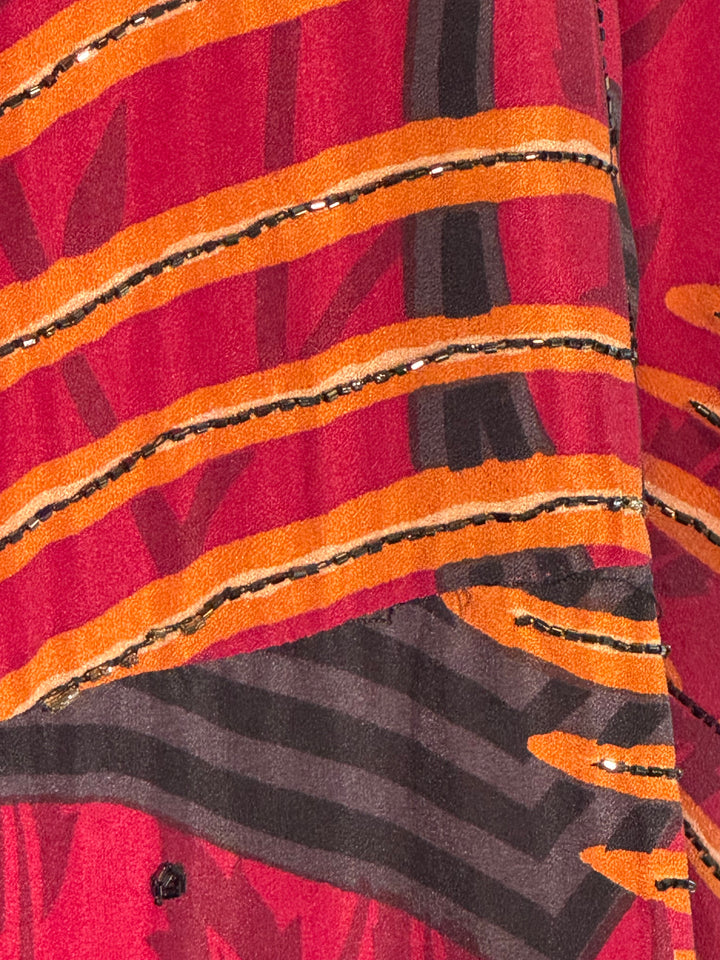 Ivy Kaftan by Silk Ranch in red vintage silk with black swirls, embroidery and golden sequins , fabric detail 2