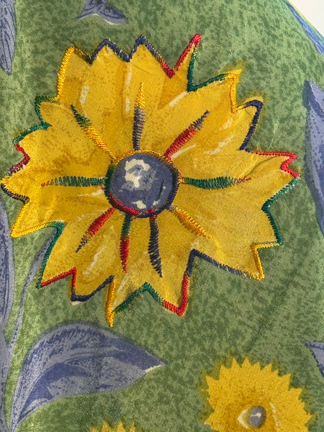 Ivy Kaftan by Silk Ranch in green vintage silk with yellow and bllue un flowers  and golden sequins, fabric detail 1