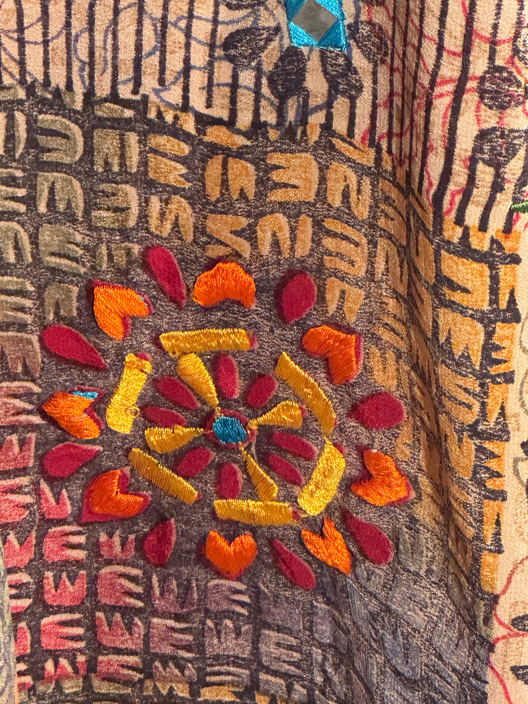Ivy Kaftan by Silk Ranch in tan patterned vintage silk with yellow, red and bllue flowers  and mirrored sequins, fabric detail 2