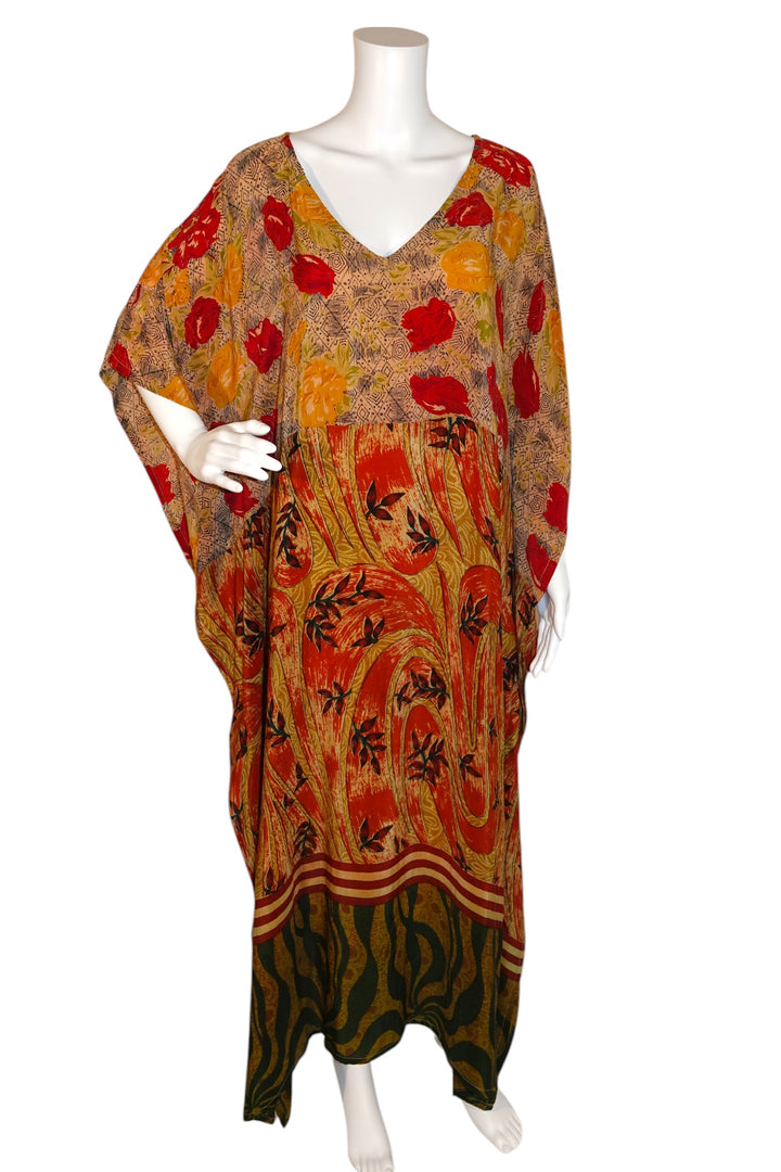 Colorful Silk Ranch kaftan in vintage silk with floral pattern on a mannequin against a white background