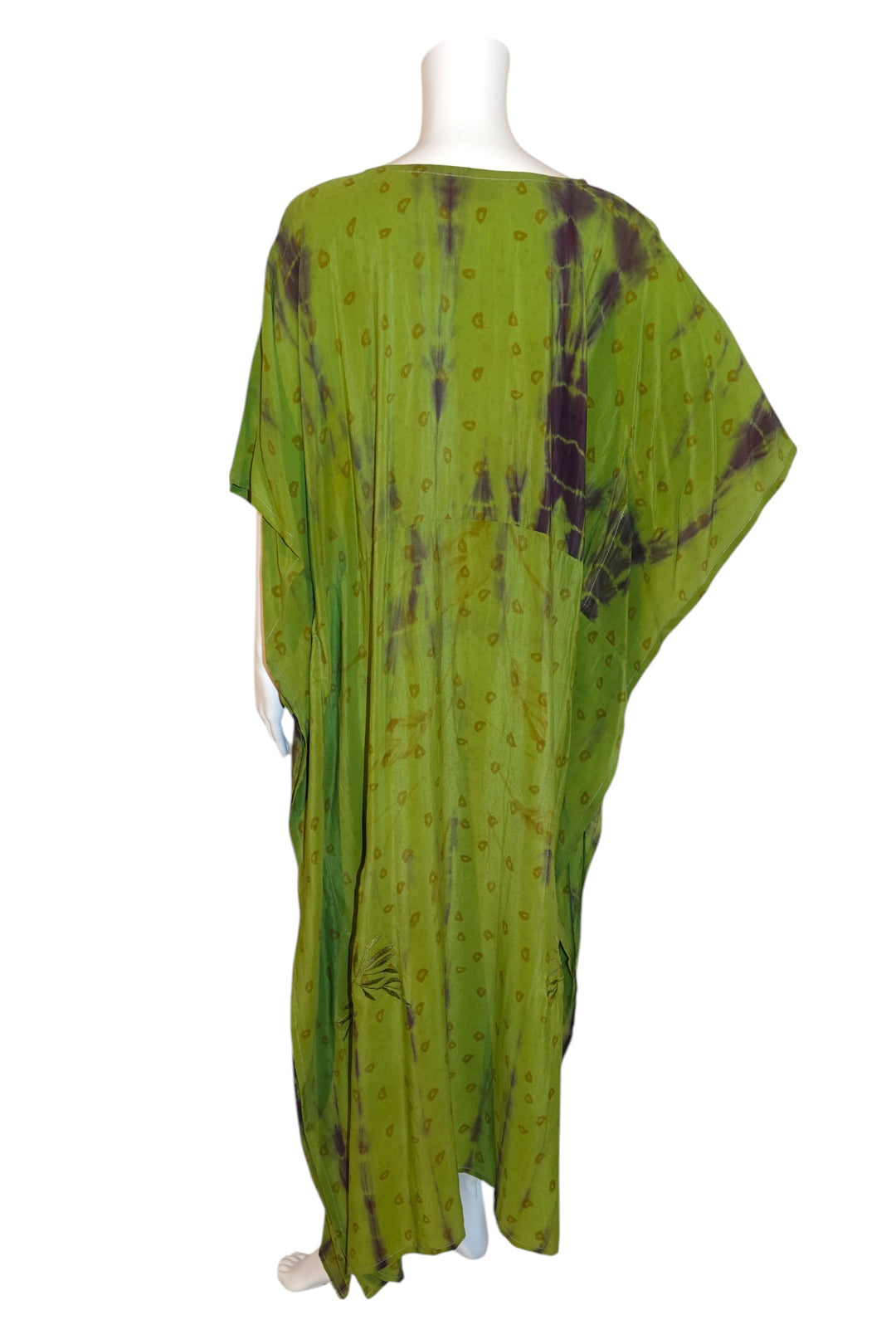 Green tie-dye kaftan in vintage silk by Silk Ranch  on a mannequin against a white background