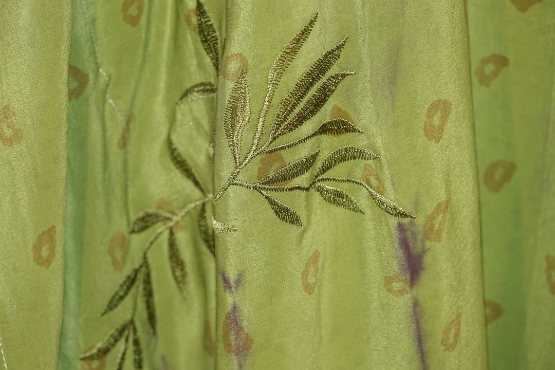 Green vintage silk with embroidered leaf design and small kiss patterns