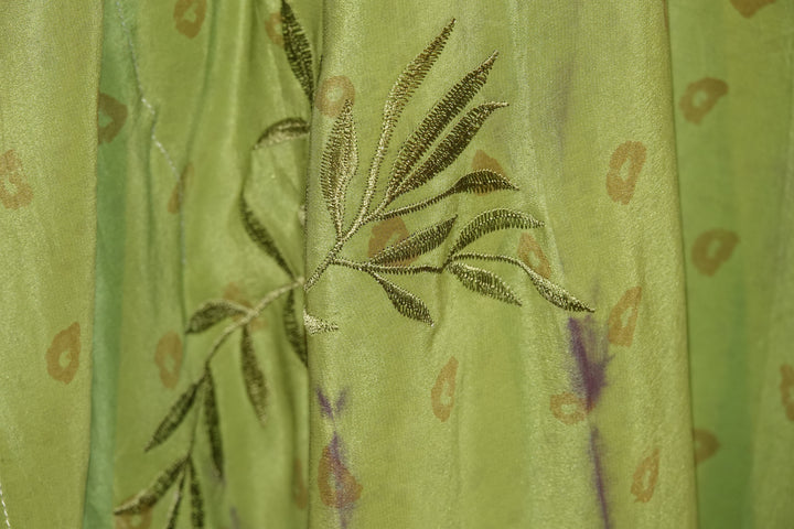 Green vintage silk with embroidered leaf design and small kiss patterns
