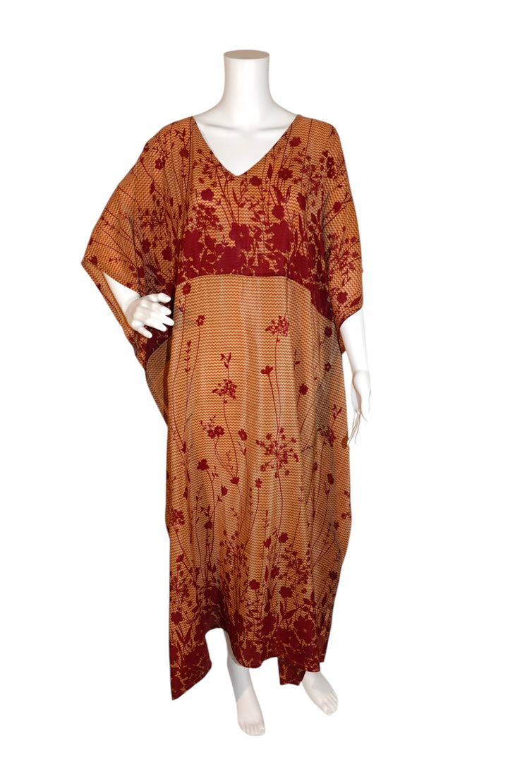 Red floral vintage silk kaftan  on a mannequin against a white background