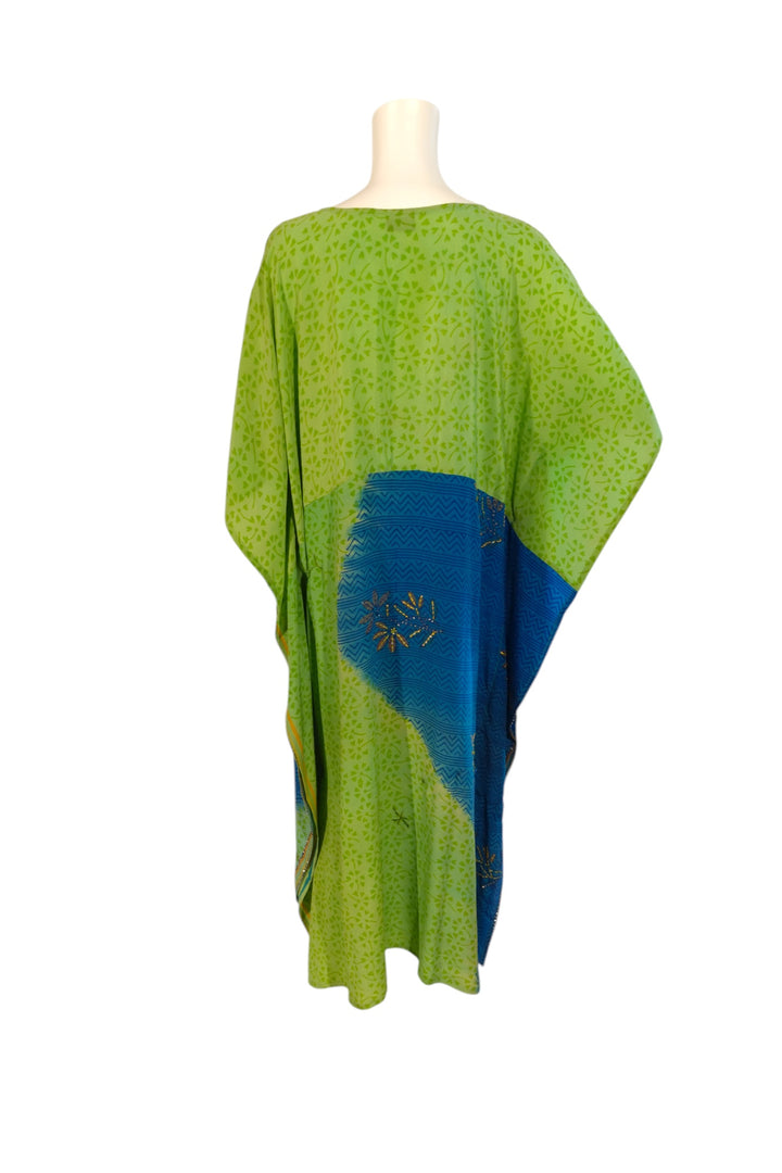 Green vintage silk kaftan with blue accent on a mannequin against a white background