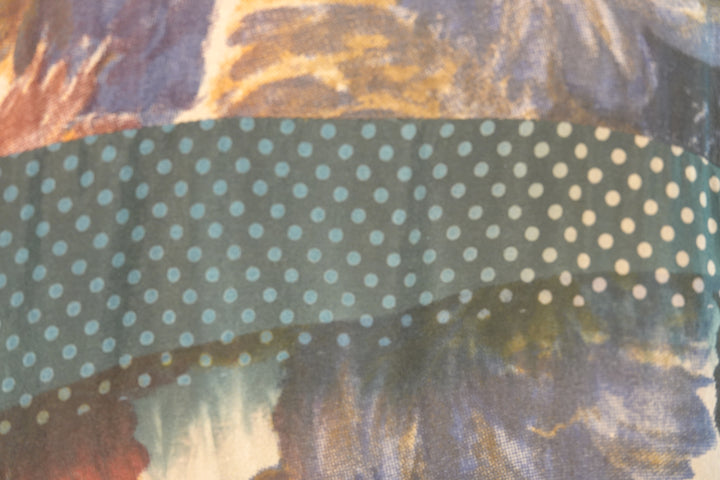 Close-up of a polka dot vintage silk in black  background