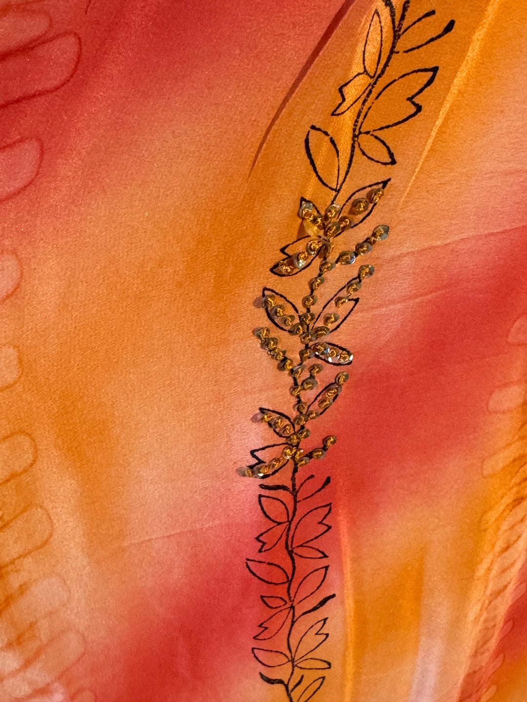 Orange and pink vintage silk with gold embroidered vines 