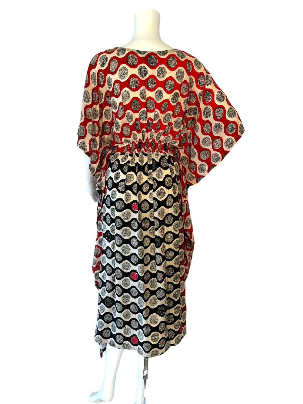 Back view of vintage silk kaftan in XS in red black and white circle print